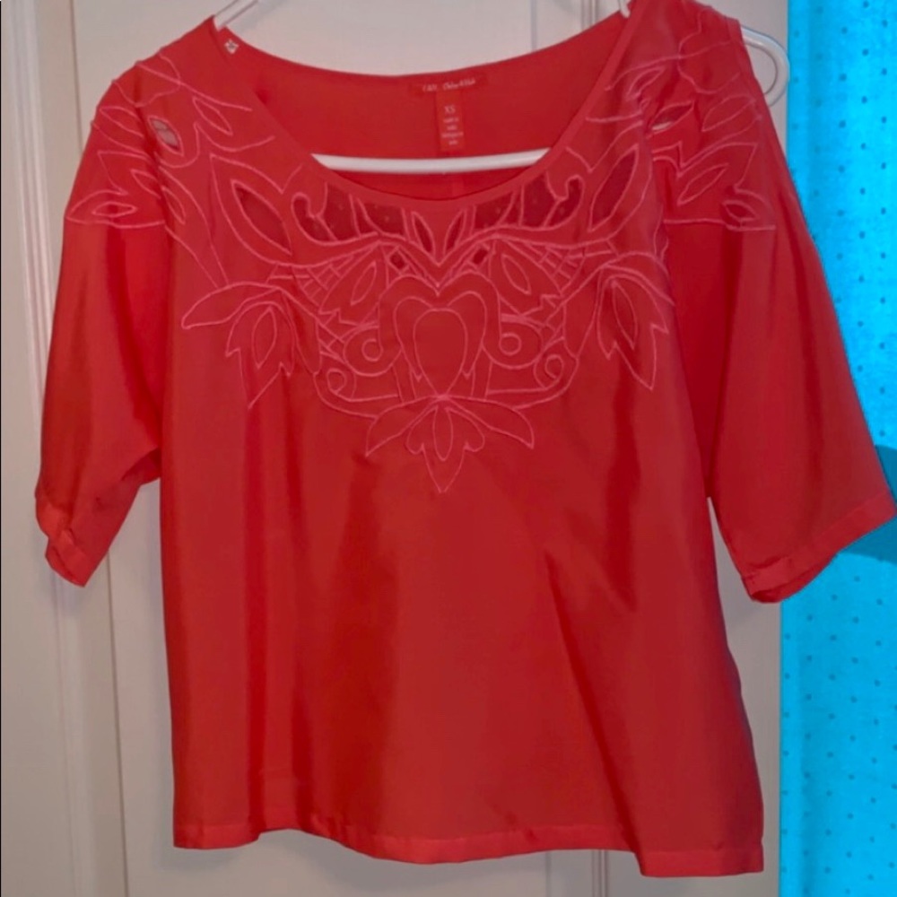 Slightly cropped coral top